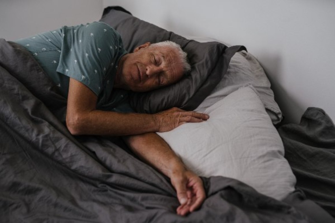 Senior sleeping in St. Petersburg, Florida for good health.